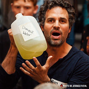 Mark Ruffalo holding a jug of water contaminated by fracking.