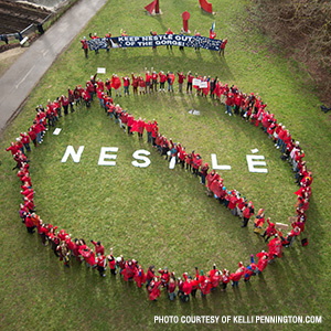 Hundreds of activists arranged themselves into a "No" over the Nestle logo to show that together we can stop them from profiting from public water.